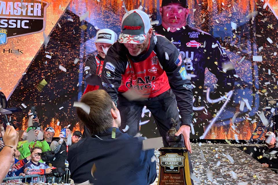 Bassmaster CEO Chase Anderson is first to congratulate the 2022 Classic winner Jason Christie.